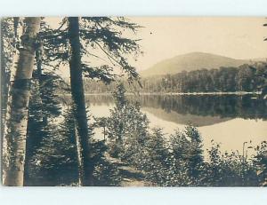 Pre-1924 rppc artistic view REFLECTION OF MOUNTAIN AND TREES IN THE WATER HM0729