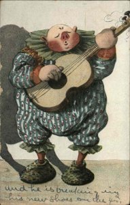 Comic Odd Looking Bald Clown Plays Guitar c1910 Vintage Postcard