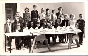 Real Photo Postcard Children Around Table Party Gathering in Rainbow, California