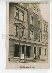 438673 GERMANY best greetings street shop orphanage view Vintage photo postcard