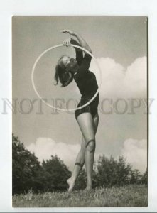 441593 Germany 1975 modern gymnastics girl with hoop advertising photo postcard