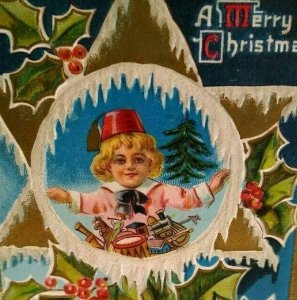 Victorian Christmas Postcard Child Fez Hat Star Lions Back M L Jackson Embossed