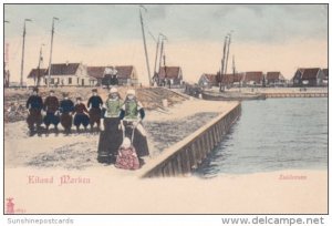 Netherlands Marken Eiland Zuidersee Locals Along Waterfront In Traditional Co...