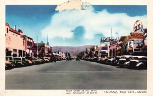 Vintage Postcard Main Street Enter Ave. Revolucion al Entrar Tijuana Boja Mexico
