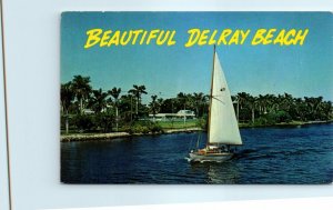 M-25659 A sailboat plys the Intracoastal Waterway at Delray Beach Florida