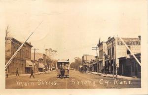 Strong KS Horse Drawn Trolley Dirt Street View Store fronts Real Photo Postcard