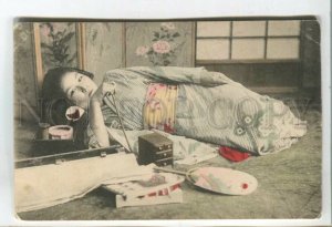 478601 Japan geisha girl in kimono having breakfast fan Vintage tinted postcard