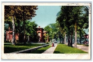 1906 Rutger Street Lady On Pathway Dirt Road Building Utica New York NY Postcard