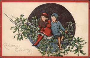 Christmas Boy and Girl Among Mistletoe c1920 Vintage Postcard