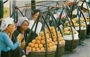 South Vietnam , Saigon, Women Selling Produce in Saigon Market, Mike Roberts 