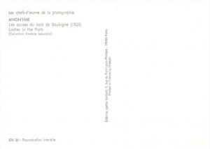 22011   2 Nude Lesbians  entering a Car