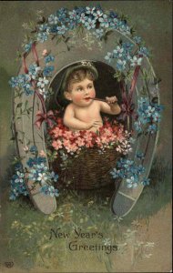 EAS New Year Fantasy Baby in Bird's Nest Basket Embossed c1910 Postcard