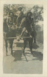 C-1910 Men Horseback Wagon Occupation RPPC Photo Postcard 20-2398