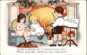 Whitney Christmas Children and Dog Play Around Fire Vintage Postcard