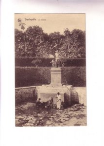 Men Working Beneath Statue, Stanleyville, Congo