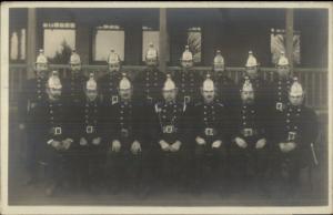 Fire Fighters Uniforms Helmets South Africa on Back c1915 Real Photo Postcard