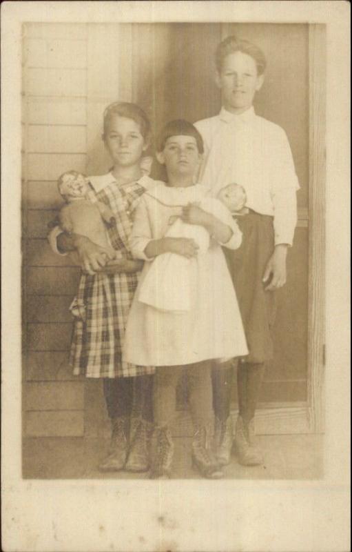 Children Dolls & Mother Old Shoes c1910 Real Photo Postcard