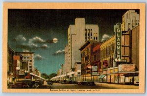 c1940's Business Section At Night Establishments Cars Lansing Michigan Postcard