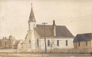 Hinckley Minnesota~Catholic Church~Wood Picket Fence by Unpaved Street~1908 RPPC