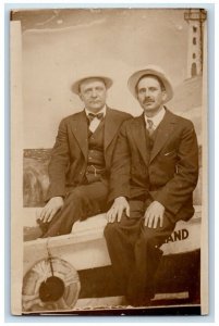 c1918 Men Studio Portrait Boat Life Saver Lighthouse View RPPC Photo Postcard