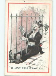 Pre-Linen Comic DRUNK MAN GETS STUCK IN THE FENCE AB8725