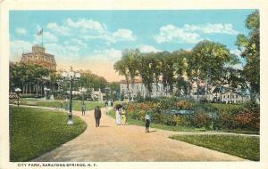 Saratoga Springs New York~Folks Stroll City Park~Buildings~1920s Postcard 