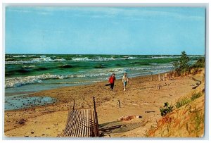 c1960's Greetings From Michigan City Indiana Beachcombing In The Spring Postcard