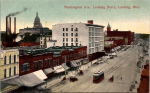 Postcard Michigan Lansing Washington Ave Streetcar Auto Shop Meat Market 1910 V3