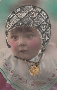 Lovely girl portrait Saint Therese medalion and glitter applied bonnet patterns