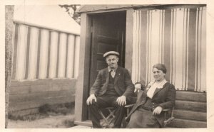 Vintage Postcard 1910's Husband and Wife Sitting on the Chair Outside the House