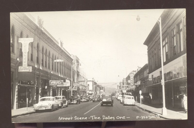 rppc the dalles oregon downtown street scene old cars real photo postcard stores