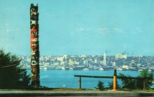 Vintage Postcard 1960 Indian Totem Pole Waterfront Skyline West Seattle WA