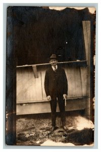 Vintage 1910's RPPC Postcard - Man in Suit in Front of Country Barn