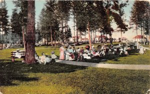 J40/ Coeur D'Alene Idaho Postcard c1910 Park Scene Buildings People 210