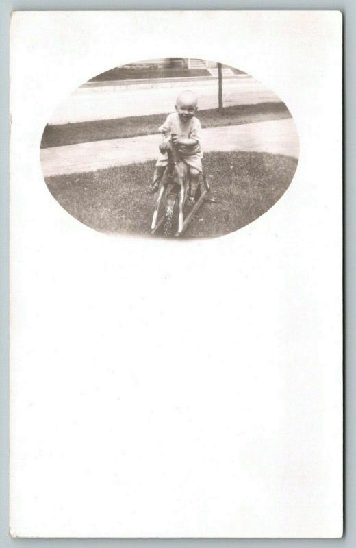 RPPC Bald 1-Year Old Baby on His Giddy-Up Riding Horse~Grabs It By the Ears~1910 