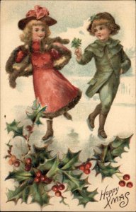 Christmas Boy and Girl Ice Skating c1910 Vintage Postcard