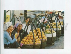 473254 South Vietnam woman selling Saigon market Germany Postage Paid RPPC