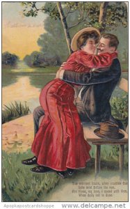 Romantic Couple Embracing on Bench 1911