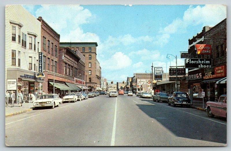 Sault Ste Marie MI~Main Street~Arbuckle Drug~5&10c Store~Bank Clock~1950s Cars