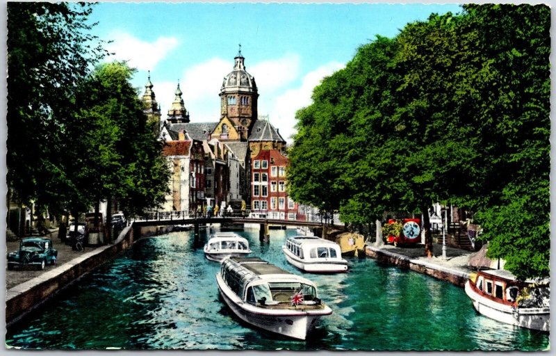 Old Amsterdam Netherlands Canal Bridge Boats Castle Lush Tress Postcard