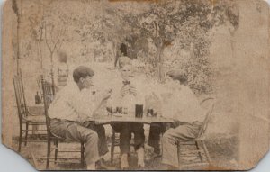 Three Men Cigars Card Game in Yard Real Photo Postcard Z23