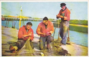 Belgium Fishermen Mending Their Nets