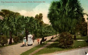 Savannah, Georgia - Mother and Child walking Palmetto Ave. in Colonial Park