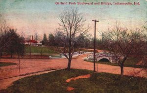 VINTAGE POSTCARD GARFIELD PARK BOULEVARD AND BRIDGE INDIANAPOLIS INDIANA c. 1915