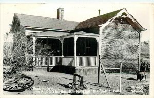 Postcard RPPC 1906 Nevada Rhyolite Bottle House United Rexall Drug NV24-2349