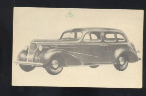 1937 CHEVROLET 4 DOOR SUICIDE DOOR CAR DEALER ADVERTISING POSTCARD CHEVY