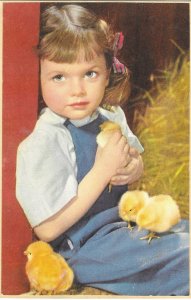 Adorable Little Girl with Fuzzy Chicks