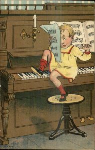 Little Boy Being Naughty Playing Piano w/ Feet c1910 Postcard