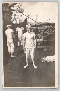 RPPC US Navy Sailors on Ships Deck Having Fun Real Photo Postcard J21