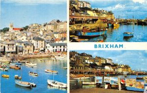 US54 UK England Brixham harbour Trawlers at fish market